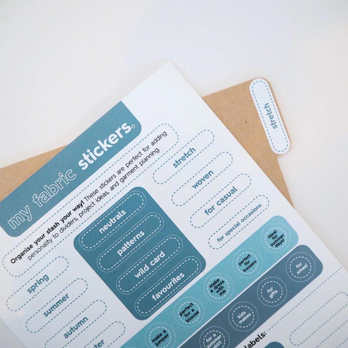 a page of stickers that are shades of blue on a white background that describe the seasons and occasions to wear clothing