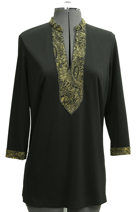 A long sleeved tunic shirt on a gray mannequin