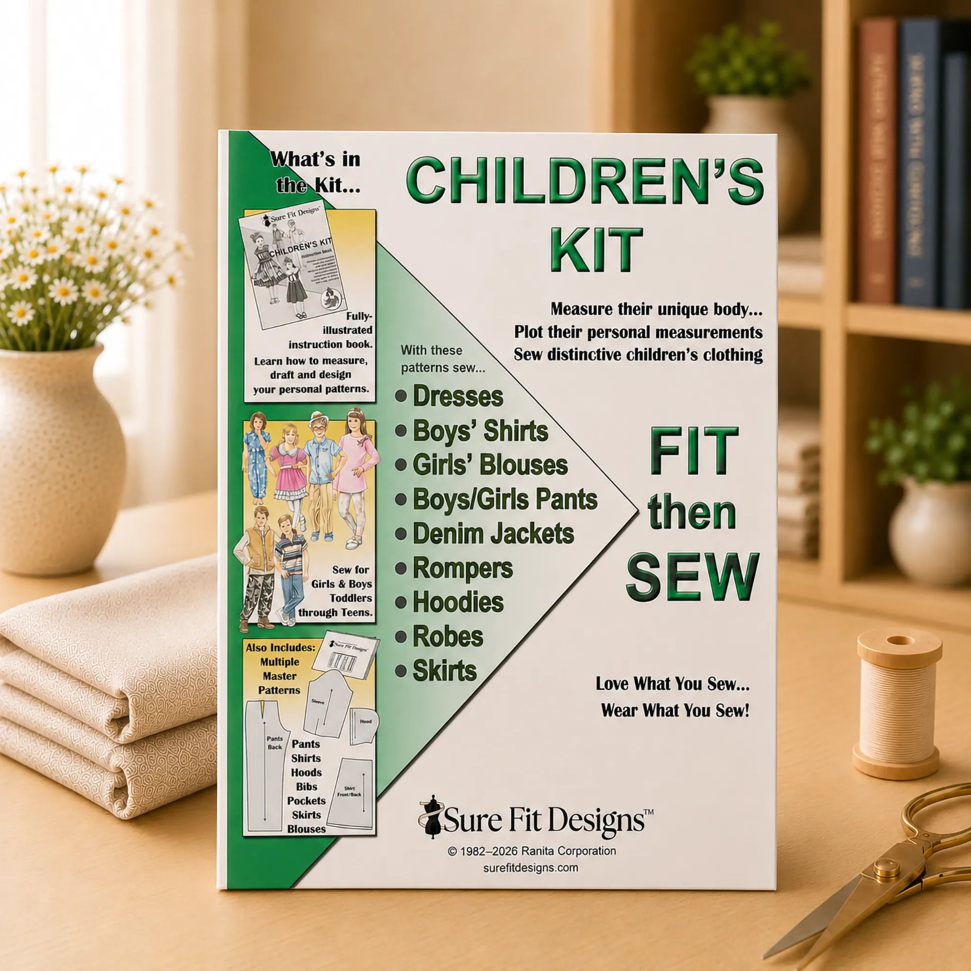 A Sure Fit Designs Children's Kit displayed vertical on a maple table with a bookcase in the background