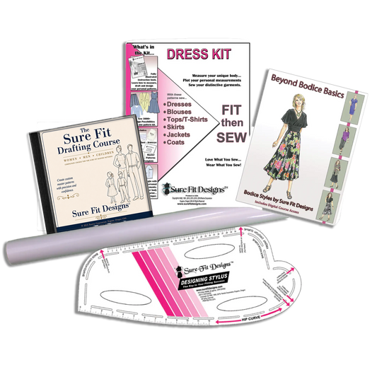 Collection of sewing books and tools on a white background