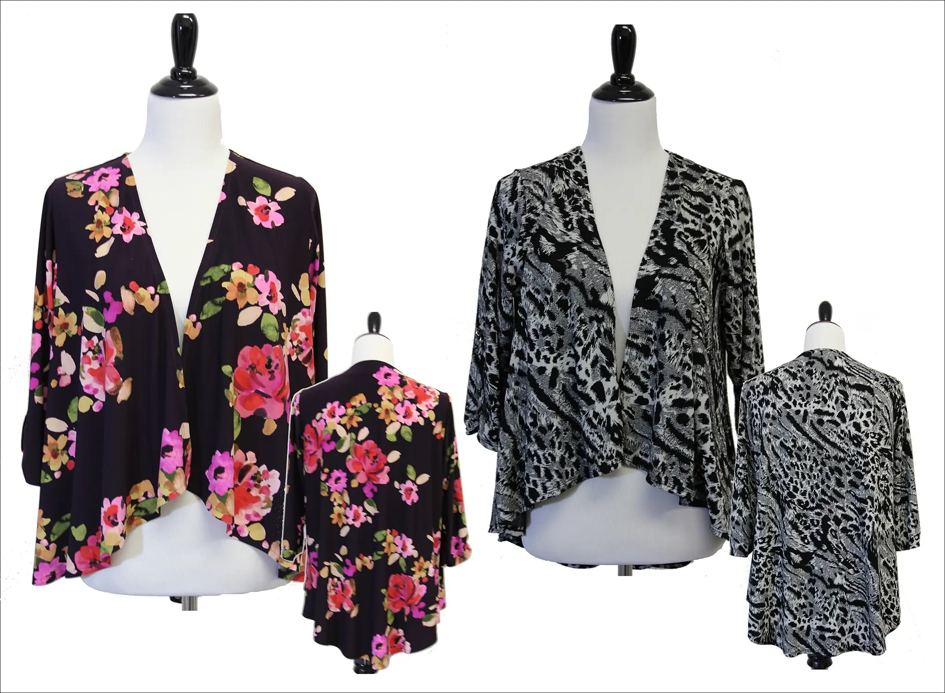 Floral and animal print cardigans on mannequins against a white background