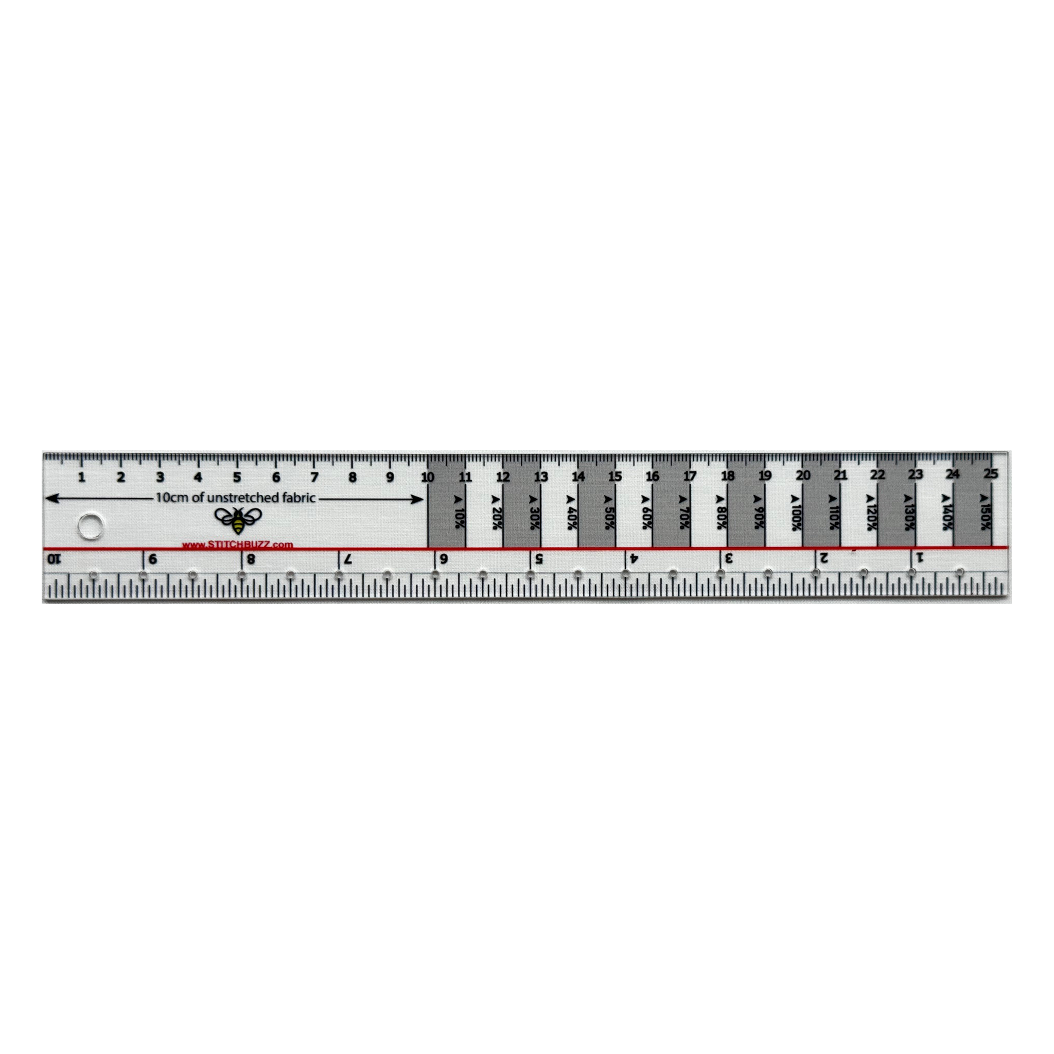 A 10 inch clear plastic ruler with gray stripes every other centimeter, used to measure the stretch and recovery of knit fabrics