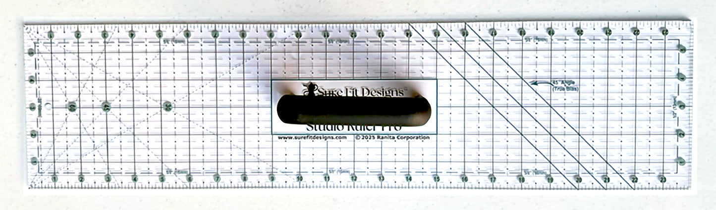 Quilting ruler with measurement markings on a white background