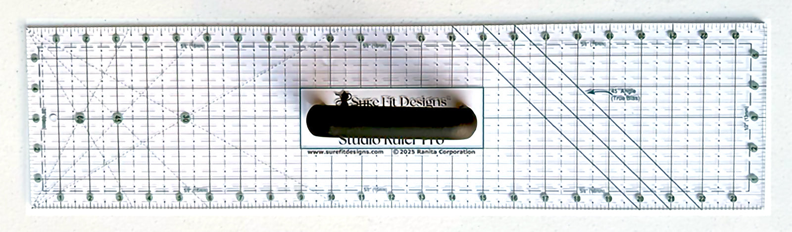 Quilting ruler with measurement markings on a white background