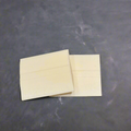 two pieces of wax tailor's chalk