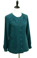 A digital sewing PDF for A long sleeved button up blouse.  the garment on the mannequin is green